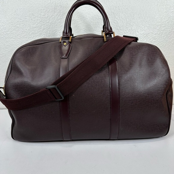 LV38 LOUIS VUITTON Taiga travel bag with strap - Picture 2 of 14